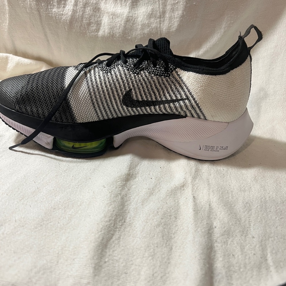 Nike Black and White Running Shoes with Green Accent